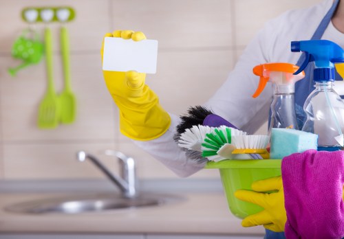 Cleaners wearing protective gloves during a carpet cleaning job