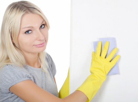 Urban bedroom showing signs that mattress cleaning is needed