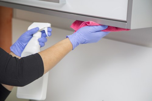 Cleaning team reviewing service terms before commencing work